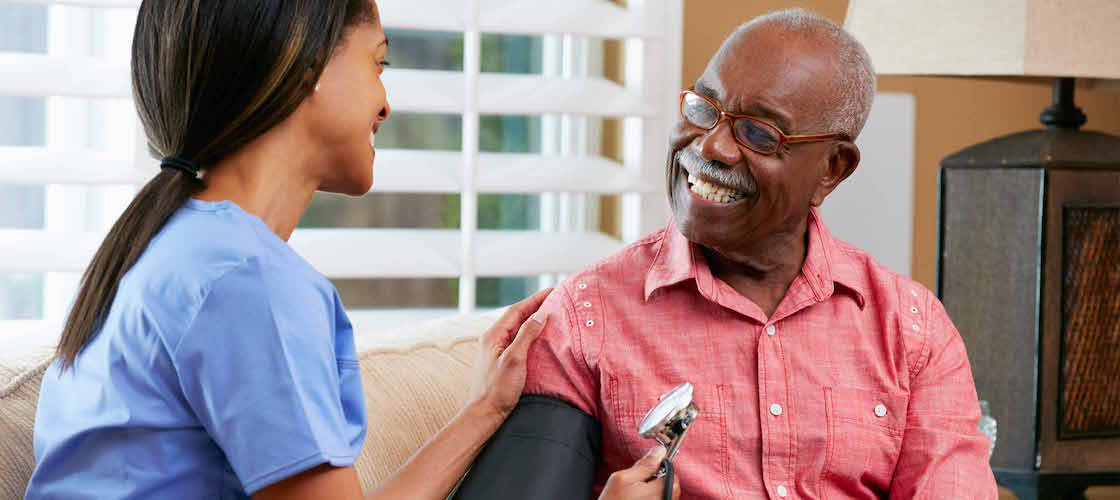 doctor taking blood pressure